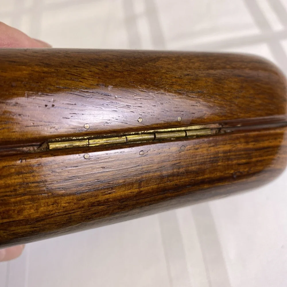 Hand carved 2 piece wood box with metal hinge, hook and metal ribs on lid